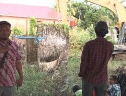 Pemuda Pancasila Ranting Desa Lama Gotroy Atasi Banjir