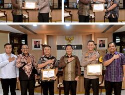 Pj Gubernur Sumut Beri Penghargaan Kapolrestabes Medan dan Kasat Reskrim