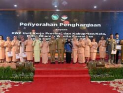 Dinas Kominfo Terima Penghargaan Mitra Kerja Terbaik dari DWP Sumut