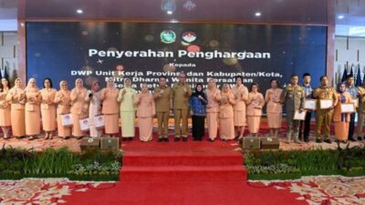 Dinas Kominfo Terima Penghargaan Mitra Kerja Terbaik dari DWP Sumut