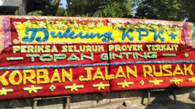 Papan Bunga Kasus Korupsi Proyek PUPR Sumut dari “Korban Jalan Rusak”