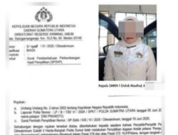 Jadi Tersangka Dugaan Penipuan, Kepala SMKN 1 Dolok Masihul Masih “Gentayangan”